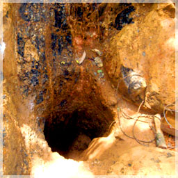 Boogey man hole to get to hard rock gold diggings / Kanyala